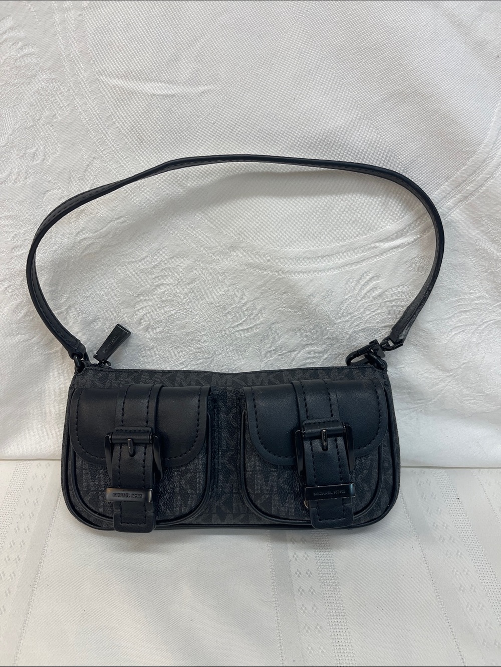 Michael Kors Zoe Small Cargo Pocket Belted Shoulder Bag in black.